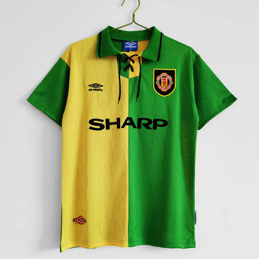 yellow and green Manchester United Kit